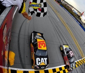 Another example of tandem racing - Clint Bowyer (33) beats drafting partner Jeff Burton (31) to the finish line by .018 seconds to win the Good Sam Club 500 at Talladega Superspeedway. Photo by Jason Smith/Getty Images