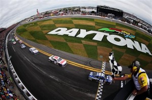 Jimmie Johnson, driver of the #48 Lowe's Chevrolet, races to the finish line to win the NASCAR Sprint Cup Series Daytona 500 at Daytona International Speedway on Feb 24, 2013 Photo - Jared C. Tilton/Getty Images