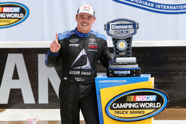 Brett Moffitt, driver of the #16 Hino Toyota, poses with the trophy in Victory Lane after winning the NASCAR Camping World Truck Series Corrigan Oil 200 at Michigan International Speedway on August 11, 2018 in Brooklyn, Michigan. Photo - Jerry Markland/Getty Images