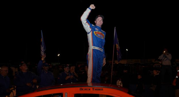 Derek Thorn celebrates as he exits his car in Victory Lane following his win in the NAPA Auto Parts 175 presented by the West Coast Stock Car Hall of Fame at Evergreen Speedway on August 11, 2018 in Monroe, Washington. Photo - Mike Tedesco/Getty Images